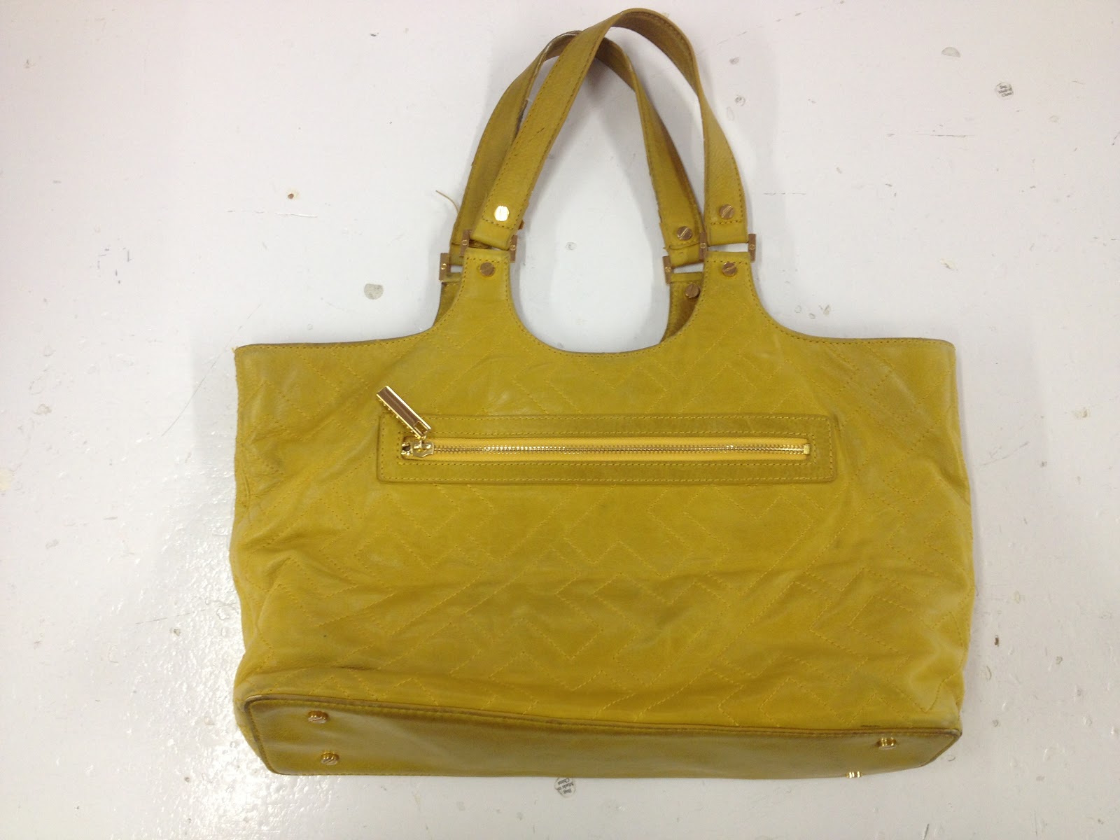 How To Clean Tory Burch Purse